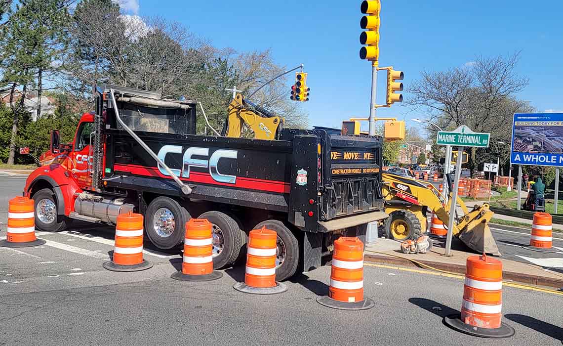 C Francis Construction Corp performing traffic light and curb installation